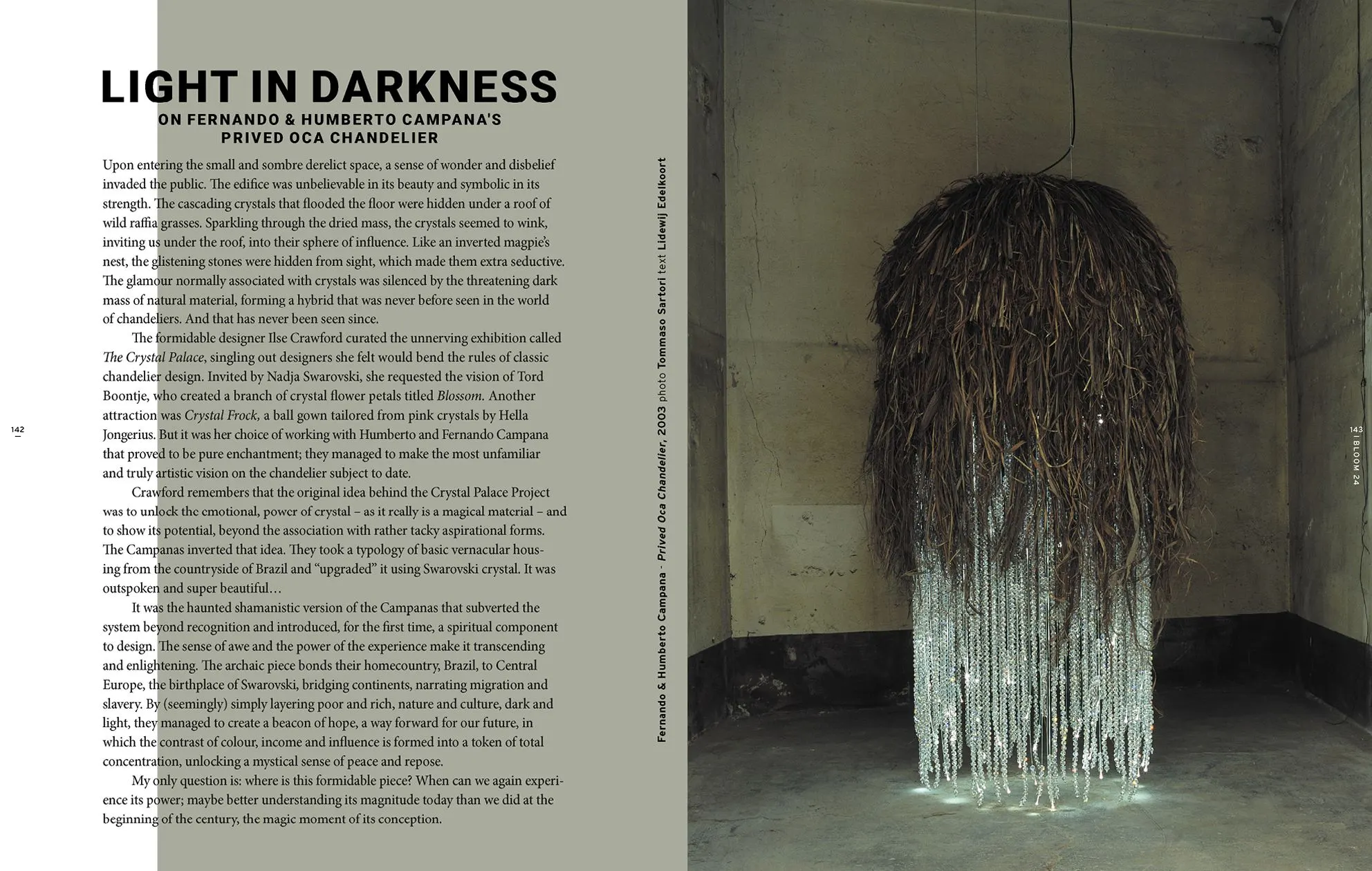 Magazine spread Light in darkness with a text column and a photo of a chandelier of hanging dark fibres and glass beads