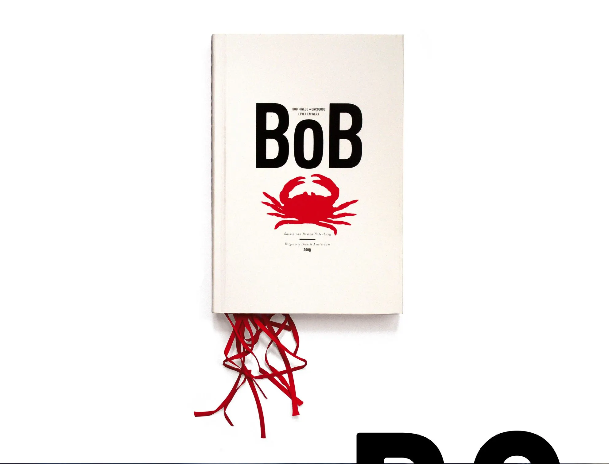 Cream book cover with the title BoB, a red crab and red ribbons hanging from the bottom